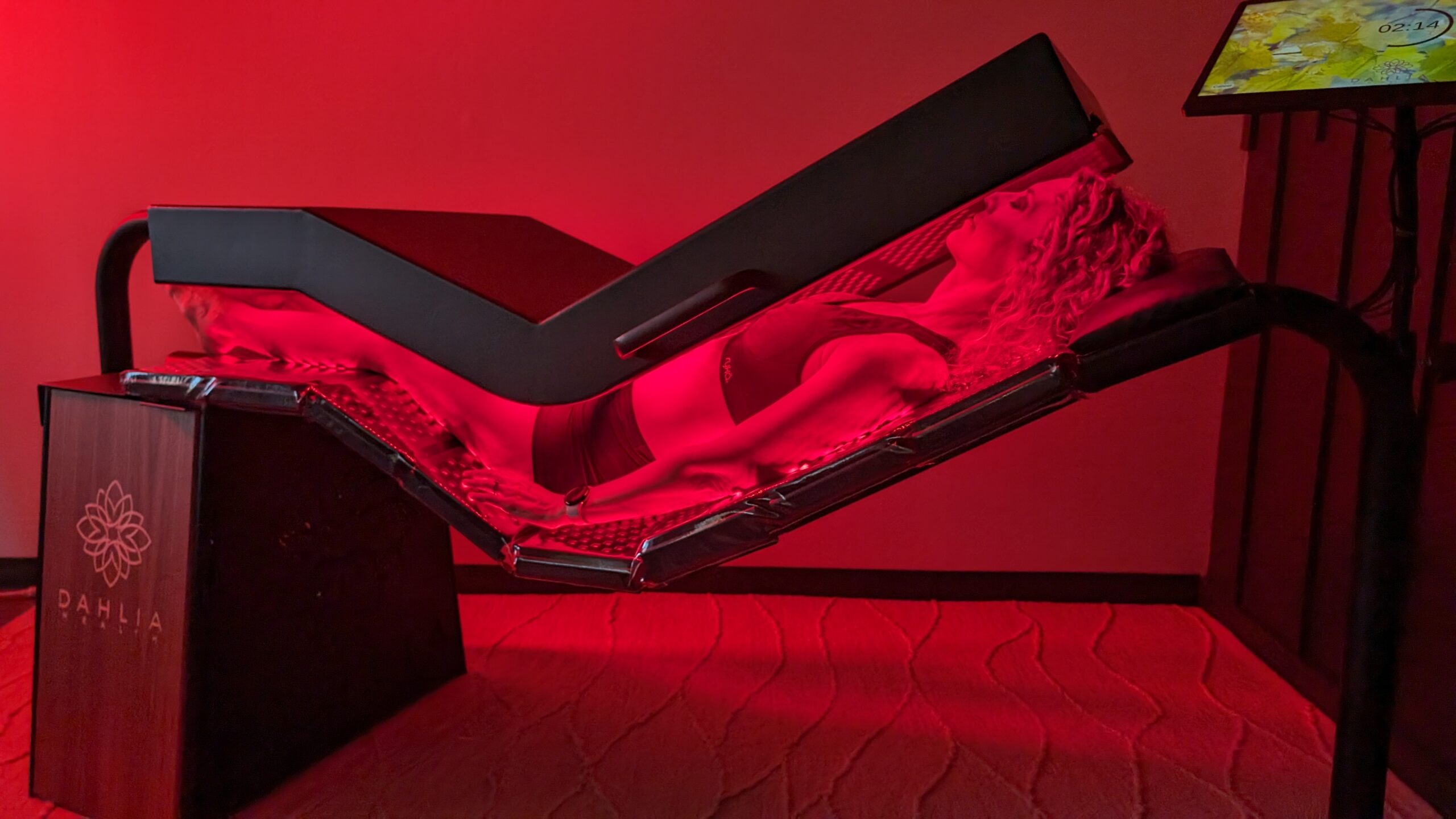 The Pinnacle full-body red light bed at Radius Chiropractic
